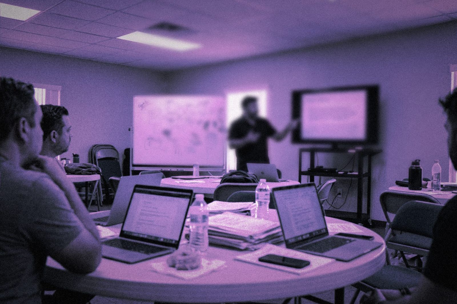 Small team working on laptops during a design workflow session