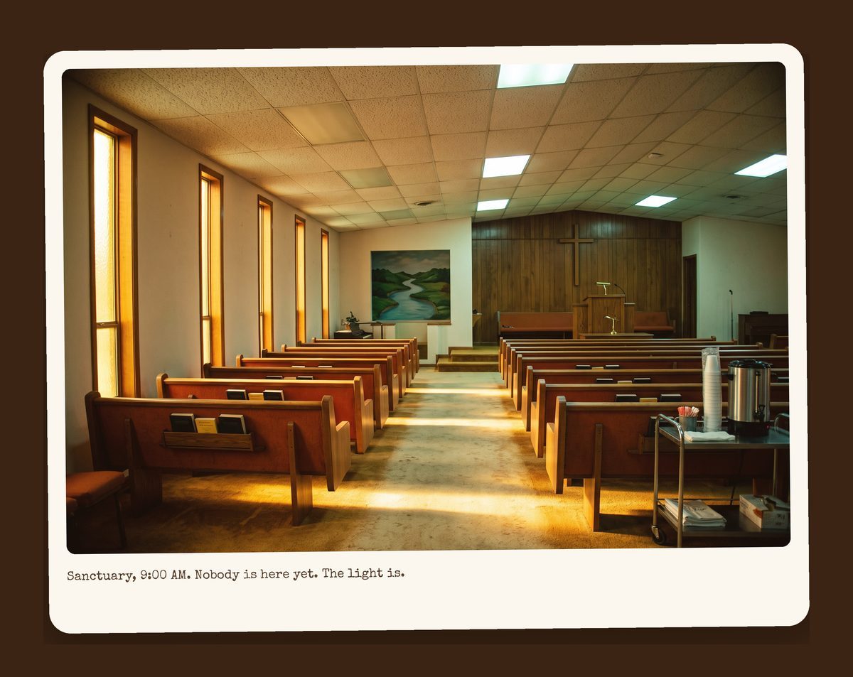 Empty sanctuary with orange pew cushions and Harvest Gold carpet