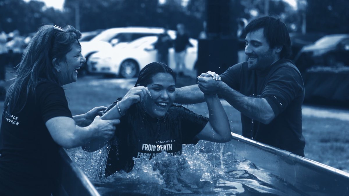 A baptism from Epic's own photography, graded through the blueprint duotone