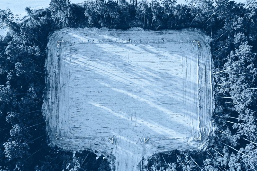 Drone frame of the cleared and graded site, blue duotone
